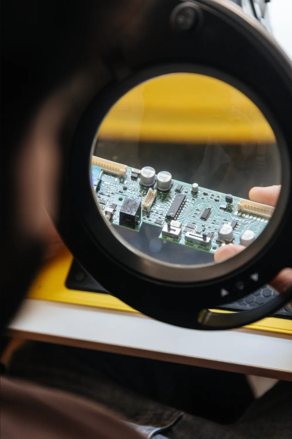 A populated board viewed through the bench magnifier